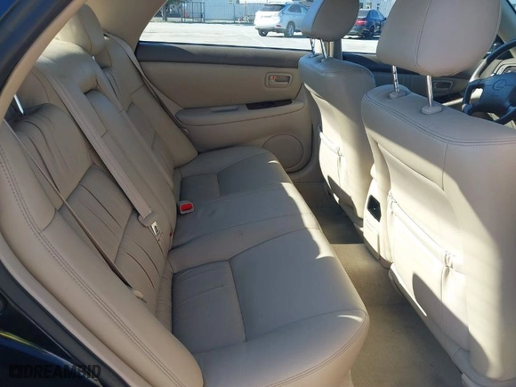 2000 Lexus ES 300 with VIN JT8BF28G2Y5093962, listed as a IAAI auction lot 41634264 with 106,951 mi miles. Bid and sale history available at carsss.com. Image 8.