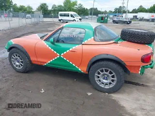 1999 Mazda MX-5 Miata with VIN JM1NB3531X0116676, listed as a IAAI auction lot 42454285 with 201,534 mi miles and . Bid and sale history available at DreamBid. Image 6.