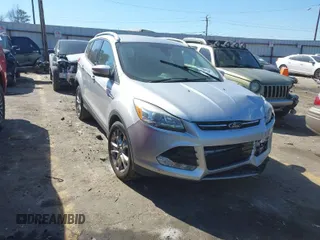 2016 Ford Escape Titanium with VIN 1FMCU0JX6GUC55800, listed as a IAAI auction lot 41662863 with 135,733 mi miles. Bid and sale history available at carsss.com. Image 1.