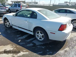 2002 Ford Mustang Standard with VIN 1FAFP40462F119838, listed as a IAAI auction lot 42801101 with Not provided miles and . Bid and sale history available at DreamBid. Image 3.
