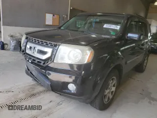 2009 Honda Pilot Touring z VIN 5FNYF48849B012203, wystawiony jako Copart lot #55901125 z przebiegiem 272 552 mil mil oraz Szkoda całkowita • Salvage title. Historia ofert i sprzedaży dostępna na DreamBid. Obrazek 1.