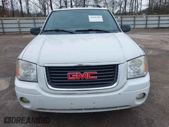 2004 GMC Envoy SLE with VIN 1GKDT13SX42357048, listed as a IAAI auction lot 41601126 with 304,101 mi miles. Bid and sale history available at carsss.com. Image 6.