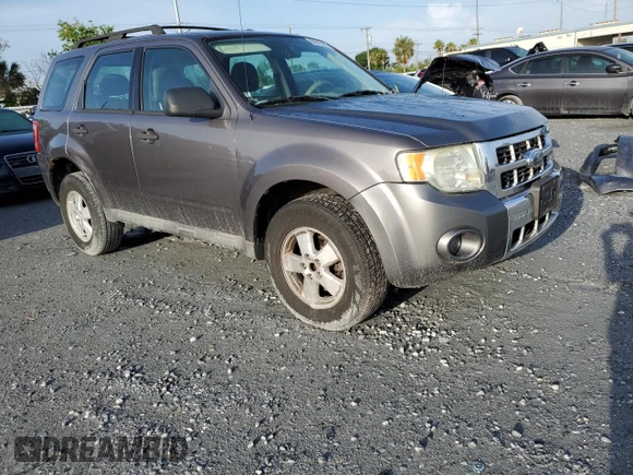 2009 Ford Escape XLS with VIN 1FMCU92749KB94402, listed as a Copart auction lot 60975645 with 171,202 mi miles and Clean title. Bid and sale history available at DreamBid. Image 4.