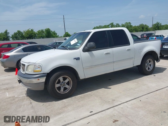 2003 Ford F-150 XLT with VIN 1FTRW07L13KB48589, listed as a IAAI auction lot 42647398 with Not provided miles and . Bid and sale history available at DreamBid. Image 2.