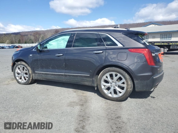 2017 Cadillac XT5 Luxury AWD with VIN 1GYKNDRS1HZ243825, listed as a Copart auction lot 52302665 with 115,674 mi miles and Salvage Title. Bid and sale history available at carsss.com. Image 2.