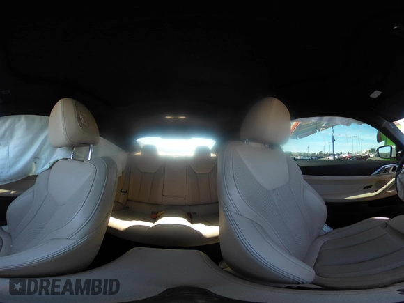 2022 BMW 4 Series 430i xDrive with VIN WBA73AP03NCH61029, listed as a IAAI auction lot 42327779 with 104,860 mi miles and . Bid and sale history available at DreamBid. Image 21.