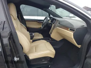 2016 Tesla Model X 70D with VIN 5YJXCBE2XGF019095, listed as a IAAI auction lot 42025230 with 109,660 mi miles and . Bid and sale history available at carsss.com. Image 5.