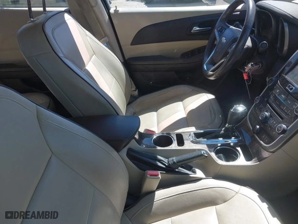 2014 Chevrolet Malibu LTZ with VIN 1G11J5SX6EF176489, listed as a IAAI auction lot 41762393 with 107,623 mi miles. Bid and sale history available at carsss.com. Image 5.