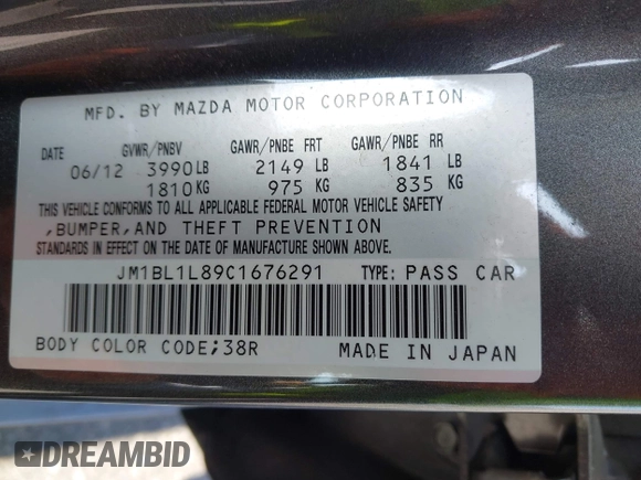 2012 Mazda Mazda3 i Touring with VIN JM1BL1L89C1676291, listed as a IAAI auction lot 42087895 with 61,805 mi miles. Bid and sale history available at carsss.com. Image 9.