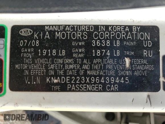 2009 Kia Rio LX with VIN KNADE223X96439445, listed as a Copart auction lot 54619335 with 102,120 mi miles and Salvage Title. Bid and sale history available at DreamBid. Image 12.