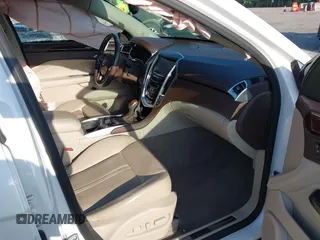 2015 Cadillac SRX Premium Collection with VIN 3GYFNDE32FS530357, listed as a IAAI auction lot 41976585 with 92,335 mi miles and . Bid and sale history available at carsss.com. Image 5.