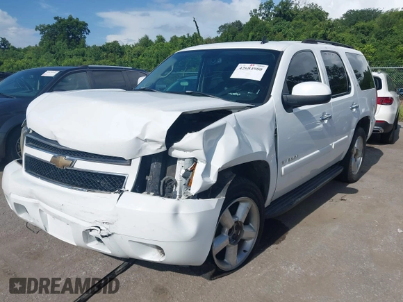 2007 Chevrolet Tahoe LT with VIN 1GNFC13J97R314853, listed as a IAAI auction lot 42684980 with 312,399 mi miles and . Bid and sale history available at DreamBid. Image 17.