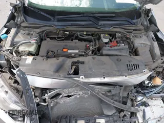2017 Honda Civic LX with VIN 2HGFC2F5XHH562089, listed as a IAAI auction lot 42010207 with 99,809 mi miles and . Bid and sale history available at DreamBid. Image 10.