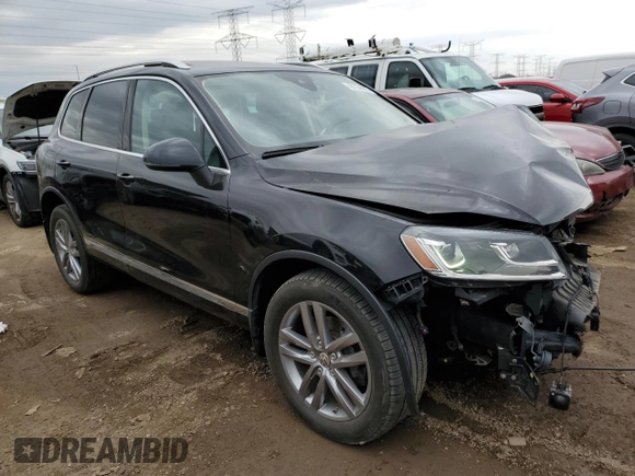 2016 Volkswagen Touareg Sport with VIN WVGEF9BP4GD011455, listed as a Copart auction lot 49734885 with 145,450 mi miles and Salvage Title. Bid and sale history available at DreamBid. Image 4.