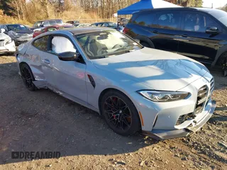 2024 BMW M4 Competition xDrive with VIN WBS43AZ02RCP63658, listed as a IAAI auction lot 41059014 with 10,863 mi miles. Bid and sale history available at carsss.com. Image 1.