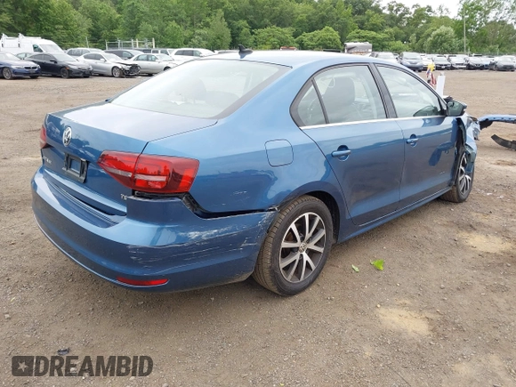 2017 Volkswagen Jetta SE with VIN 3VWDB7AJ1HM394626, listed as a IAAI auction lot 42594926 with 106,973 mi miles and . Bid and sale history available at DreamBid. Image 4.