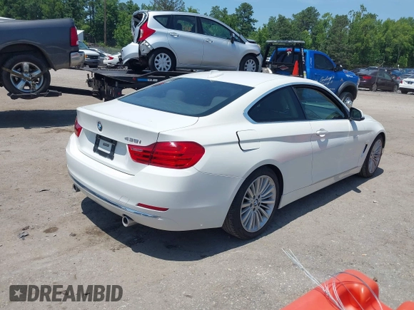 2014 BMW 4 Series 435i with VIN WBA3R1C52EF729201, listed as a IAAI auction lot 42579604 with 145,277 mi miles and . Bid and sale history available at DreamBid. Image 4.