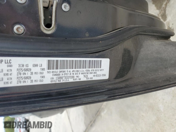 2014 Ram 1500 Express with VIN 1C6RR6FT5ES372289, listed as a Copart auction lot 51607935 with 127,190 mi miles and Salvage title. Bid and sale history available at DreamBid. Image 14.