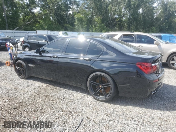 2013 BMW 7 Series 750i with VIN WBAYA8C58DC996431, listed as a Copart auction lot 70366064 with 106,580 mi miles and Salvage Title. Bid and sale history available at DreamBid. Image 2.