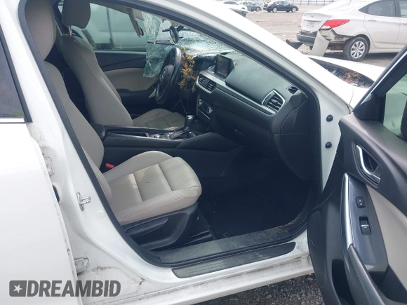 2016 Mazda Mazda6 i Touring with VIN JM1GJ1V56G1448334, listed as a IAAI auction lot 42075222 with 52,883 mi miles. Bid and sale history available at carsss.com. Image 5.