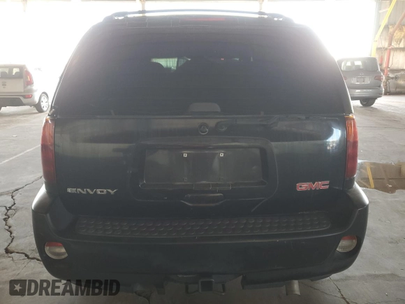2006 GMC Envoy Denali with VIN 1GKES63M662302685, listed as a Copart auction lot 74315054 with 80,134 mi miles and Salvage Title. Bid and sale history available at carsss.com. Image 6.