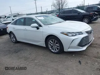2021 Toyota Avalon XLE z VIN 4T1AZ1FB2MU058100, wystawiony jako IAAI lot #41710999 z przebiegiem 78 782 mil mil oraz . Historia ofert i sprzedaży dostępna na DreamBid. Obrazek 1.