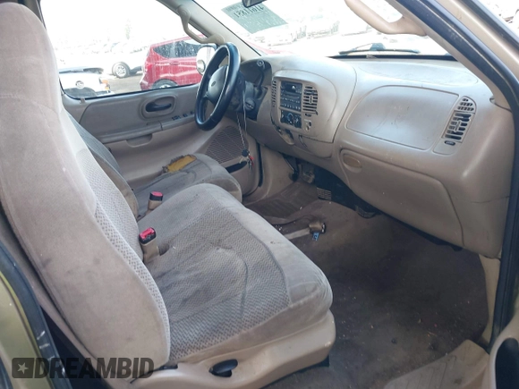 2000 Ford F-150 XL with VIN 1FTZX1723YKB48613, listed as a IAAI auction lot 41611851 with 187,450 mi miles. Bid and sale history available at carsss.com. Image 5.
