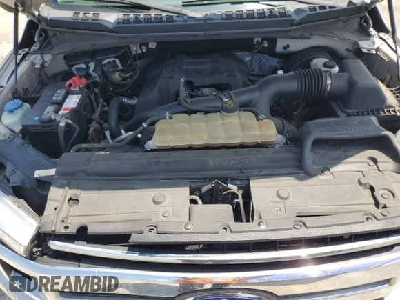 2018 Ford F-150 XL z VIN 1FTEW1CP1JKC28176, wystawiony jako Copart lot #66037815 z przebiegiem 98 084 mil mil oraz Szkoda całkowita • Salvage title. Historia ofert i sprzedaży dostępna na DreamBid. Obrazek 11.