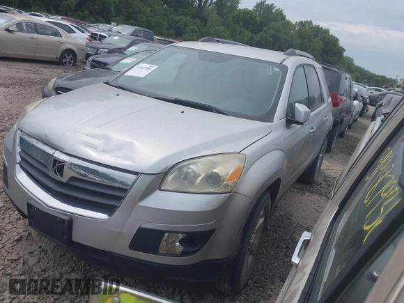 2010 Saturn Outlook XE z VIN 5GZLRTEDXAJ210535, wystawiony jako IAAI lot #39369705 z przebiegiem 199 117 mil mil oraz . Historia ofert i sprzedaży dostępna na DreamBid. Obrazek 2.
