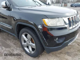 2013 Jeep Grand Cherokee Overland with VIN 1C4RJECG5DC621149, listed as a IAAI auction lot 41255140 with 157,355 mi miles. Bid and sale history available at carsss.com. Image 6.