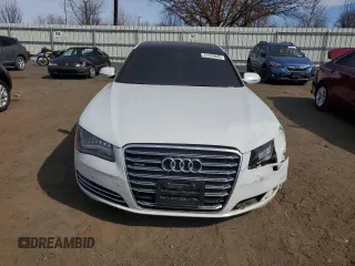 2014 Audi A8 3.0T z VIN WAURGAFD5EN007438, wystawiony jako Copart lot #47979945 z przebiegiem 147 236 mil mil oraz Szkody całkowita. Historia ofert i sprzedaży dostępna na DreamBid. Obrazek 5.