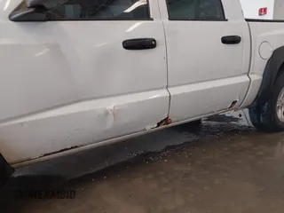 2005 Dodge Dakota SLT with VIN 1D7HW48N05S195964, listed as a IAAI auction lot 41508687 with 226,285 mi miles. Bid and sale history available at carsss.com. Image 6.
