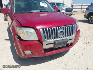 2011 Mercury Mariner Premier with VIN 4M2CN8HG3BKJ08774, listed as a IAAI auction lot 42007038 with 127,551 mi miles. Bid and sale history available at carsss.com. Image 6.