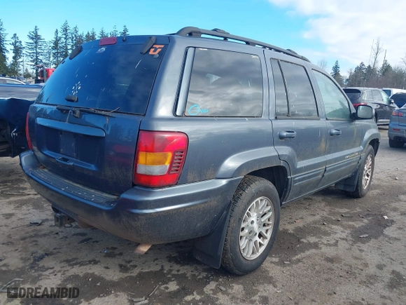 2003 Jeep Grand Cherokee Limited with VIN 1J8GW58S93C589285, listed as a IAAI auction lot 41467743 with 231,614 mi miles. Bid and sale history available at carsss.com. Image 4.