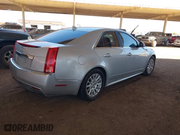 2013 Cadillac CTS Luxury with VIN 1G6DE5E52D0156666, listed as a IAAI auction lot 42058687 with 120,659 mi miles and . Bid and sale history available at DreamBid. Image 4.