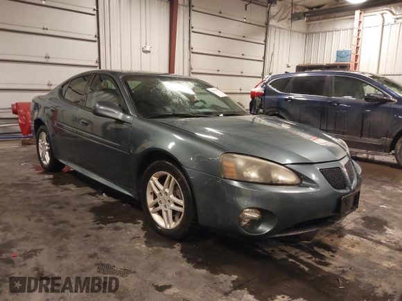 2006 Pontiac Grand Prix GT z VIN 2G2WR554461315118, wystawiony jako IAAI lot #41583027 z przebiegiem 243 614 mil mil oraz . Historia ofert i sprzedaży dostępna na DreamBid. Obrazek 1.