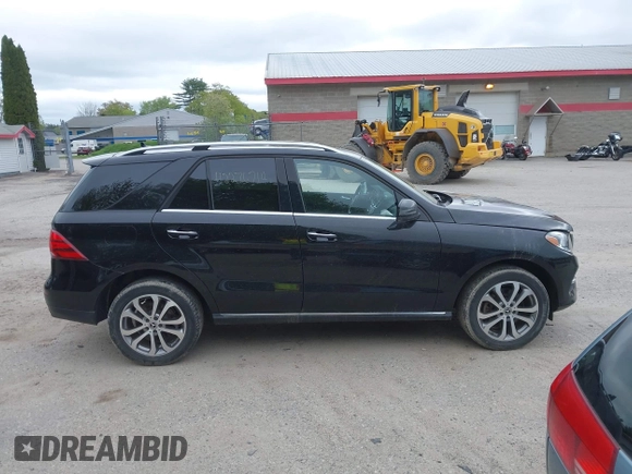 2019 Mercedes-Benz GLE 400 z VIN 4JGDA5GB2KB216941, wystawiony jako IAAI lot #42276714 z przebiegiem 17 992 mil mil oraz . Historia ofert i sprzedaży dostępna na DreamBid. Obrazek 14.
