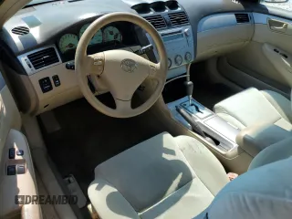 2005 Toyota Solara SE z VIN 4T1CE38P65U545679, wystawiony jako Copart lot #75669154 z przebiegiem 200 988 mil mil oraz Szkoda całkowita • Salvage title. Historia ofert i sprzedaży dostępna na DreamBid. Obrazek 8.