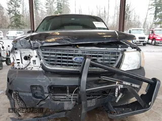 2003 Ford Explorer XLS z VIN 1FMZU62K33UB97283, wystawiony jako IAAI lot #41657337 z przebiegiem Nie podano mil oraz . Historia ofert i sprzedaży dostępna na DreamBid. Obrazek 12.
