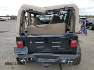 2002 Jeep Wrangler Sahara with VIN 1J4FA59S02P740550, listed as a Copart auction lot 47607795 with 182,187 mi miles and Salvage Title. Bid and sale history available at carsss.com. Image 6.