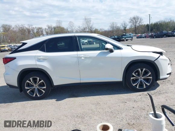2018 Lexus RX 350 with VIN 2T2BZMCA2JC164234, listed as a IAAI auction lot 42030641 with 74,160 mi miles and . Bid and sale history available at DreamBid. Image 14.