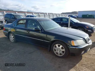 2002 Acura RL with VIN JH4KA96502C010671, listed as a IAAI auction lot 41998263 with 248,336 mi miles. Bid and sale history available at carsss.com. Image 1.