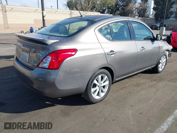 2014 Nissan Versa S with VIN 3N1CN7APXEL817010, listed as a IAAI auction lot 41460129 with 137,040 mi miles. Bid and sale history available at carsss.com. Image 4.