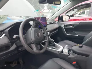 2023 Toyota RAV4 Hybrid XLE Premium with VIN 4T3B6RFV9PU117919, listed as a IAAI auction lot 42528322 with 27,236 mi miles and . Bid and sale history available at DreamBid. Image 17.