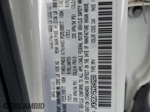 2016 Mazda CX-5 Touring z VIN JM3KE2CY5G0849288, wystawiony jako Copart lot #54594545 z przebiegiem 90 882 mil mil oraz Szkoda całkowita • Salvage title. Historia ofert i sprzedaży dostępna na DreamBid. Obrazek 13.
