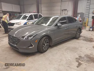2022 Hyundai Sonata Hybrid Blue with VIN KMHL24JJ3NA048305, listed as a IAAI auction lot 41572735 with 88,085 mi miles. Bid and sale history available at carsss.com. Image 2.