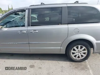 2016 Chrysler Town & Country Touring with VIN 2C4RC1BG0GR173192, listed as a IAAI auction lot 42247573 with 186,187 mi miles and . Bid and sale history available at DreamBid. Image 14.