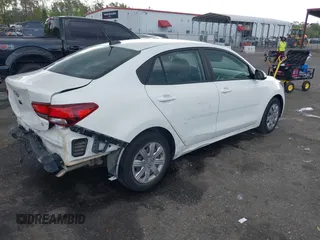 2021 Kia Rio LX with VIN 3KPA24AD0ME395186, listed as a IAAI auction lot 41865802 with 52,351 mi miles and . Bid and sale history available at DreamBid. Image 4.