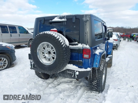 2010 Jeep Wrangler Sahara z VIN 1J4AA5D18AL170957, wystawiony jako IAAI lot #41599820 z przebiegiem 64 217 mil mil oraz . Historia ofert i sprzedaży dostępna na DreamBid. Obrazek 4.
