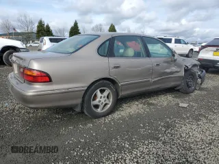 1998 Toyota Avalon XL with VIN 4T1BF18B0WU284522, listed as a Copart auction lot 45590925 with 278,690 mi miles and Salvage Title. Bid and sale history available at DreamBid. Image 3.